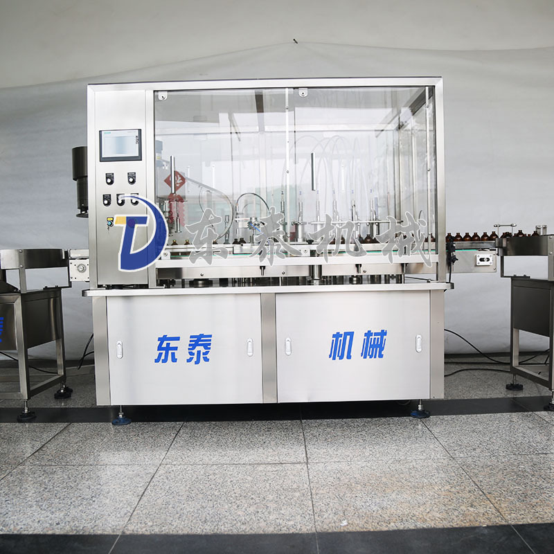 液體灌裝封口機(jī) 液體灌裝封口機